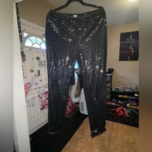 Black sequin pants. Short inseam. Sequins front and back.